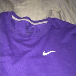 purple nike shirt